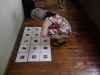 Liz Clay reviewing student feltwork